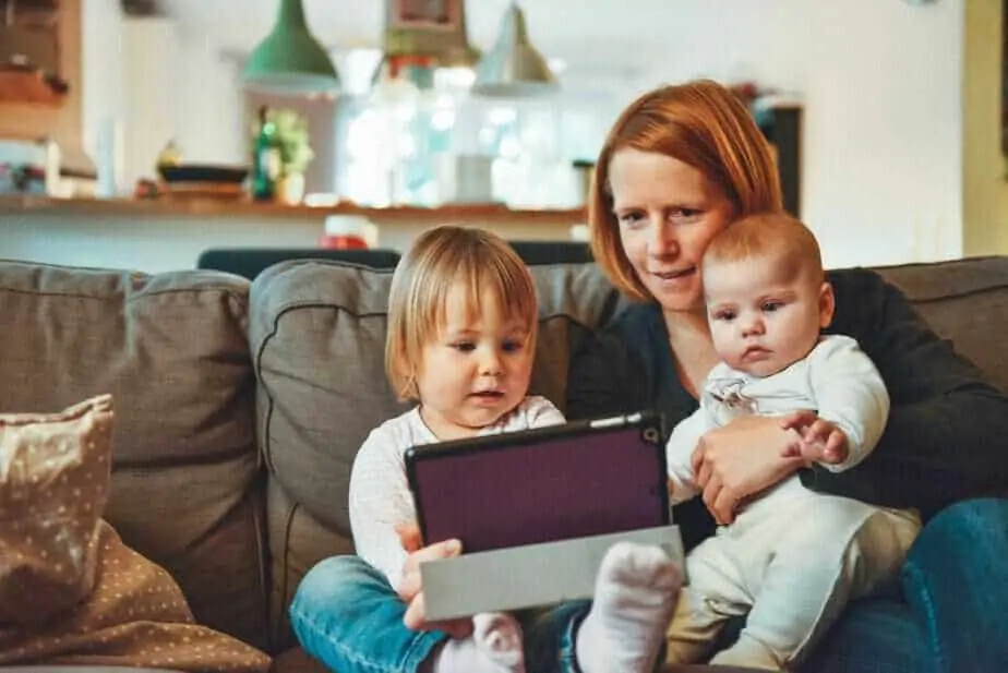 mom with two kids preparing for travel