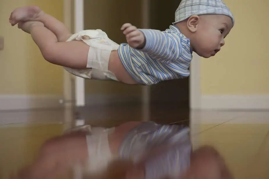 flying baby in diaper