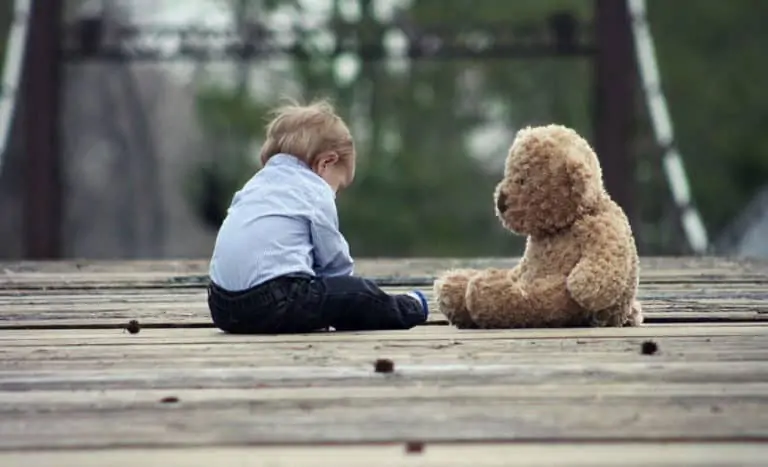 baby boy and teddy